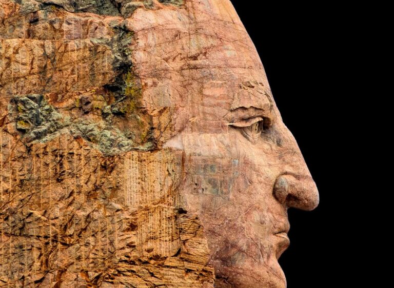 Rock art of a mans face facing right