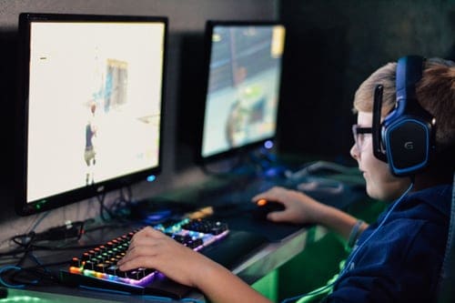 boy playing a game on the computer